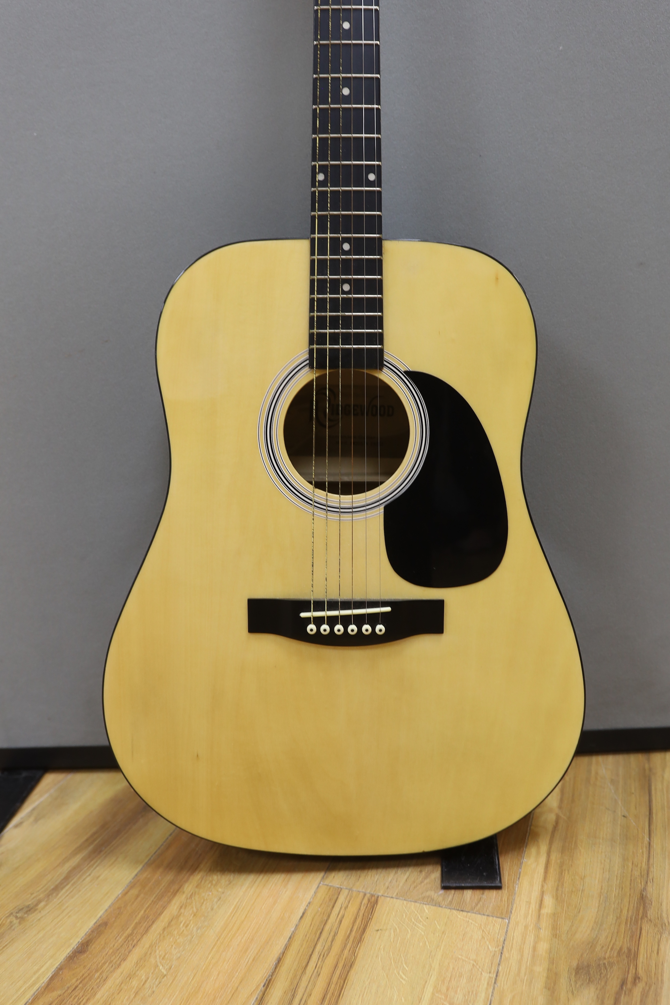 A Rockwood acoustic guitar, in a soft case